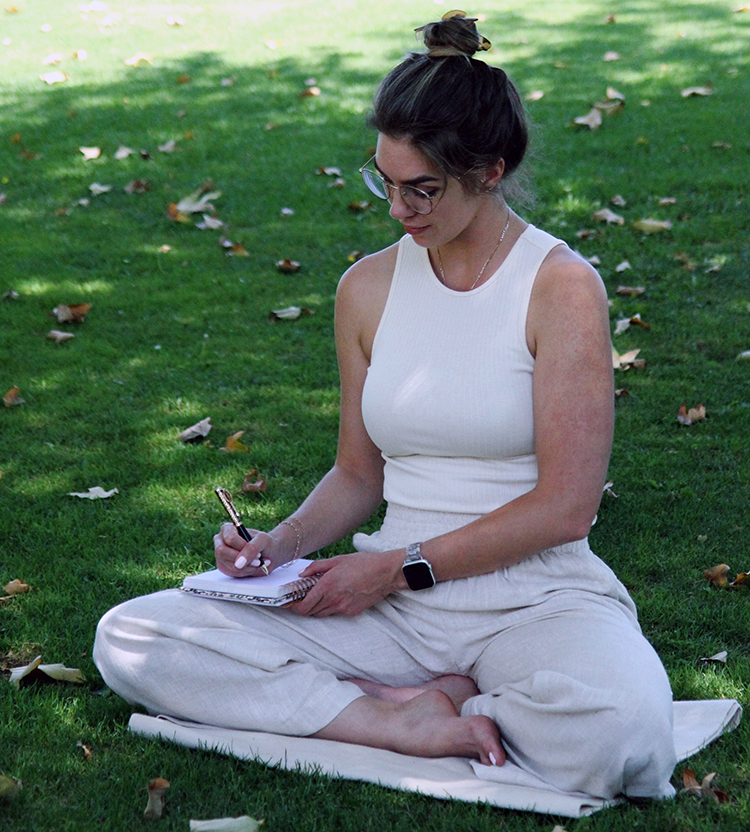 Jennifer journaling outdoors